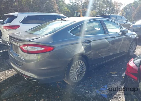2014 Ford Fusion Titanium z USA, uszkodzony, nr VIN 3FA6P0K98ER257602